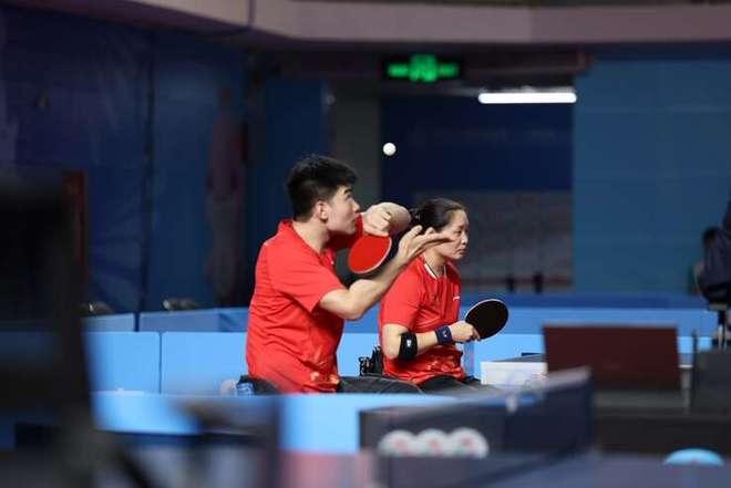 乒乓球残奥冠军也是摄影玩家(图2)